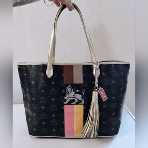 MCM Princess Lion Tote Bag With Coin Pouch,  MCM Bag Charm And MCM Wallet